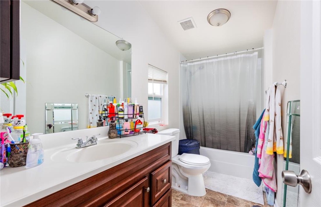8450 G Avenue Hesperia, CA 92345 - Photo 10 of 10 a bathroom with a sink vanity and a toilet