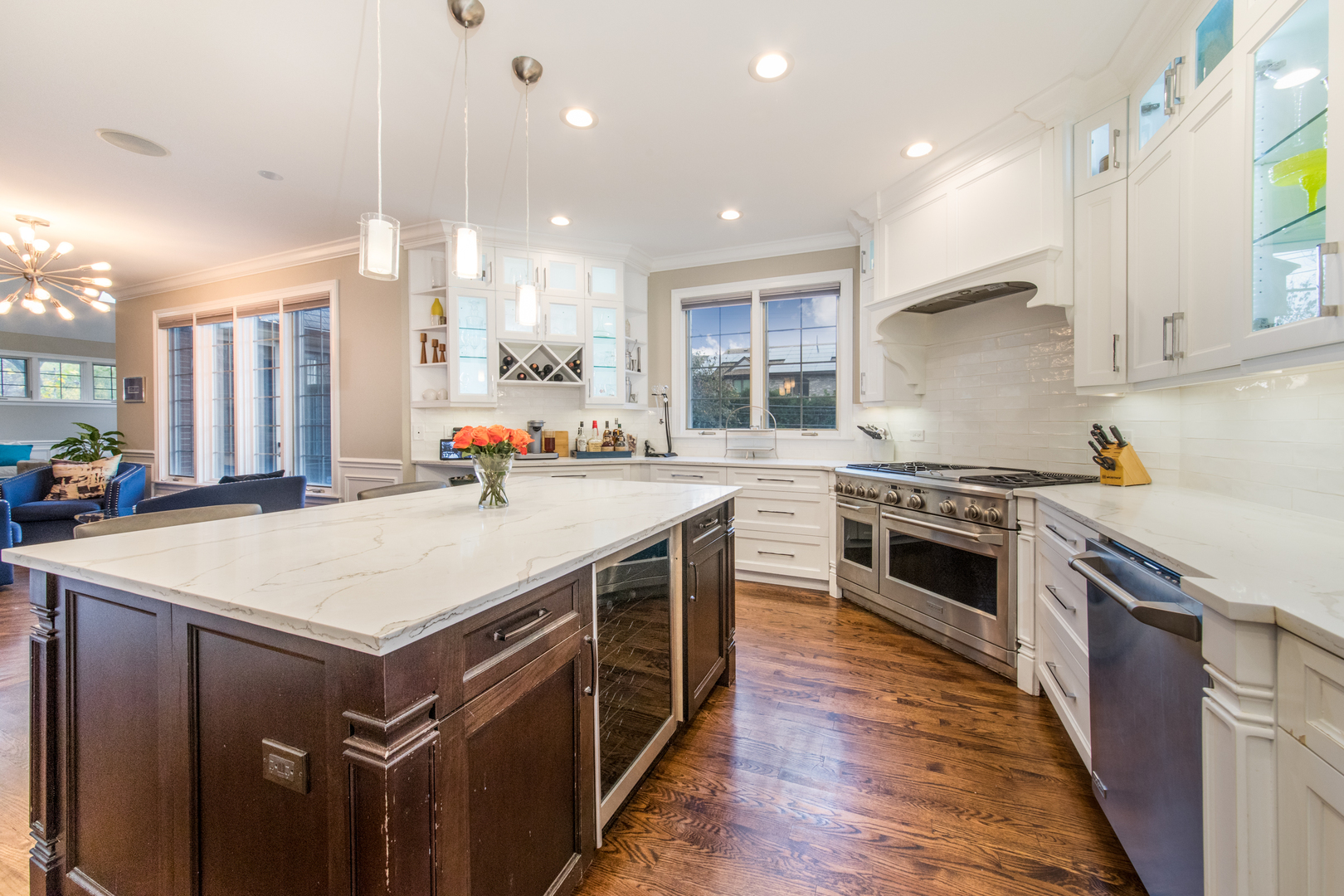 2360 Oak Tree Lane Park Ridge, IL 60068 - Photo 14 of 44 a kitchen with a stove a sink and a refrigerator
