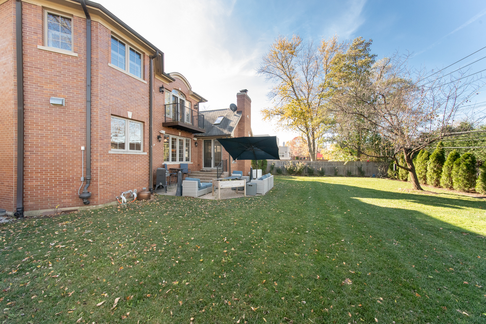 2360 Oak Tree Lane Park Ridge, IL 60068 - Photo 38 of 44 a front view of a house with a yard