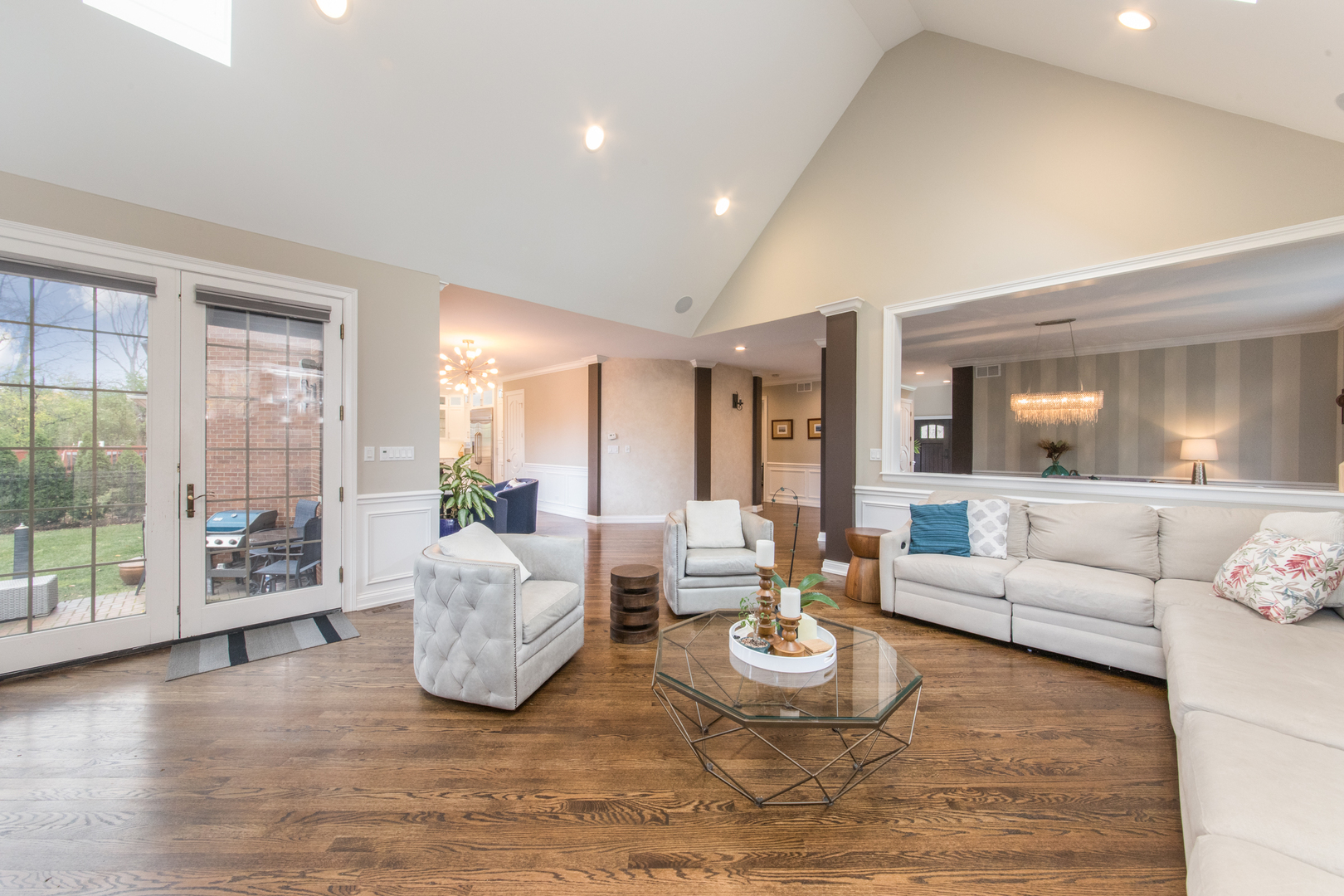 2360 Oak Tree Lane Park Ridge, IL 60068 - Photo 9 of 44 a living room with furniture and a large window