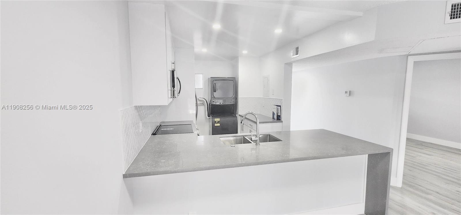 8040 North Colony Circle, Unit 309 Tamarac, FL 33321 - Photo 3 of 15 a close view of kitchen sink