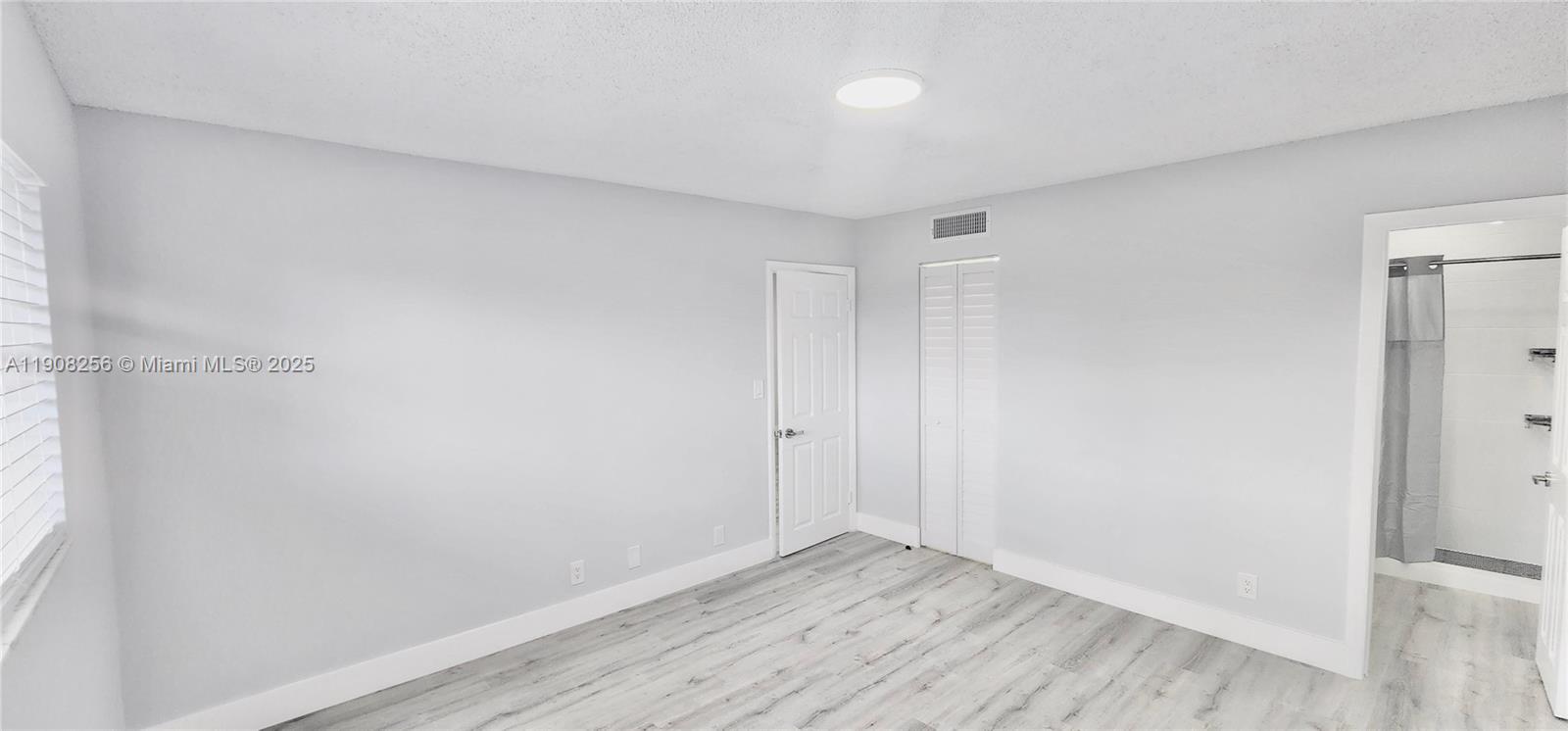 8040 North Colony Circle, Unit 309 Tamarac, FL 33321 - Photo 8 of 15 a view of an empty room