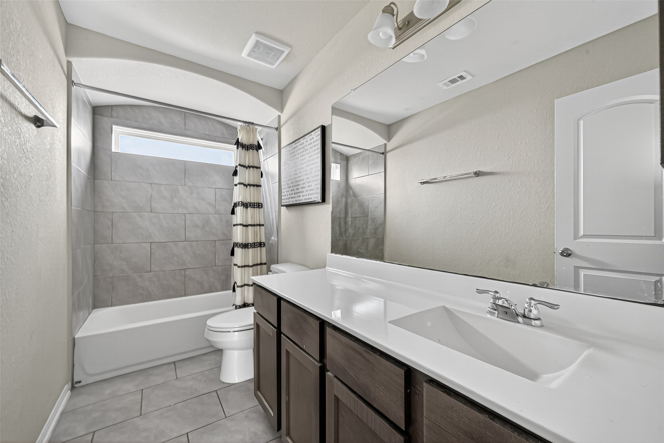 3035 Tandem Court Rosenberg, TX 77471 - Photo 19 of 28 a bathroom with a double vanity sink toilet mirror and shower