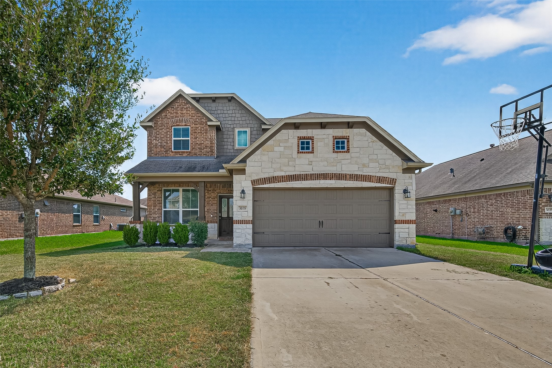 3035 Tandem Court Rosenberg, TX 77471 - Photo 2 of 28 a front view of a house with garden