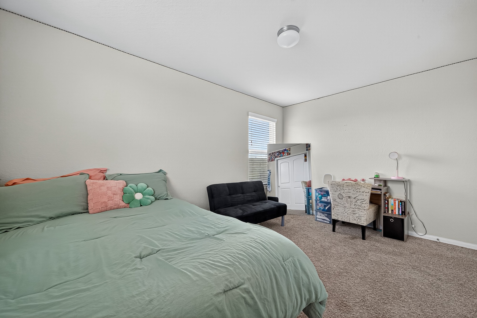 3035 Tandem Court Rosenberg, TX 77471 - Photo 21 of 28 a bedroom with a bed and car