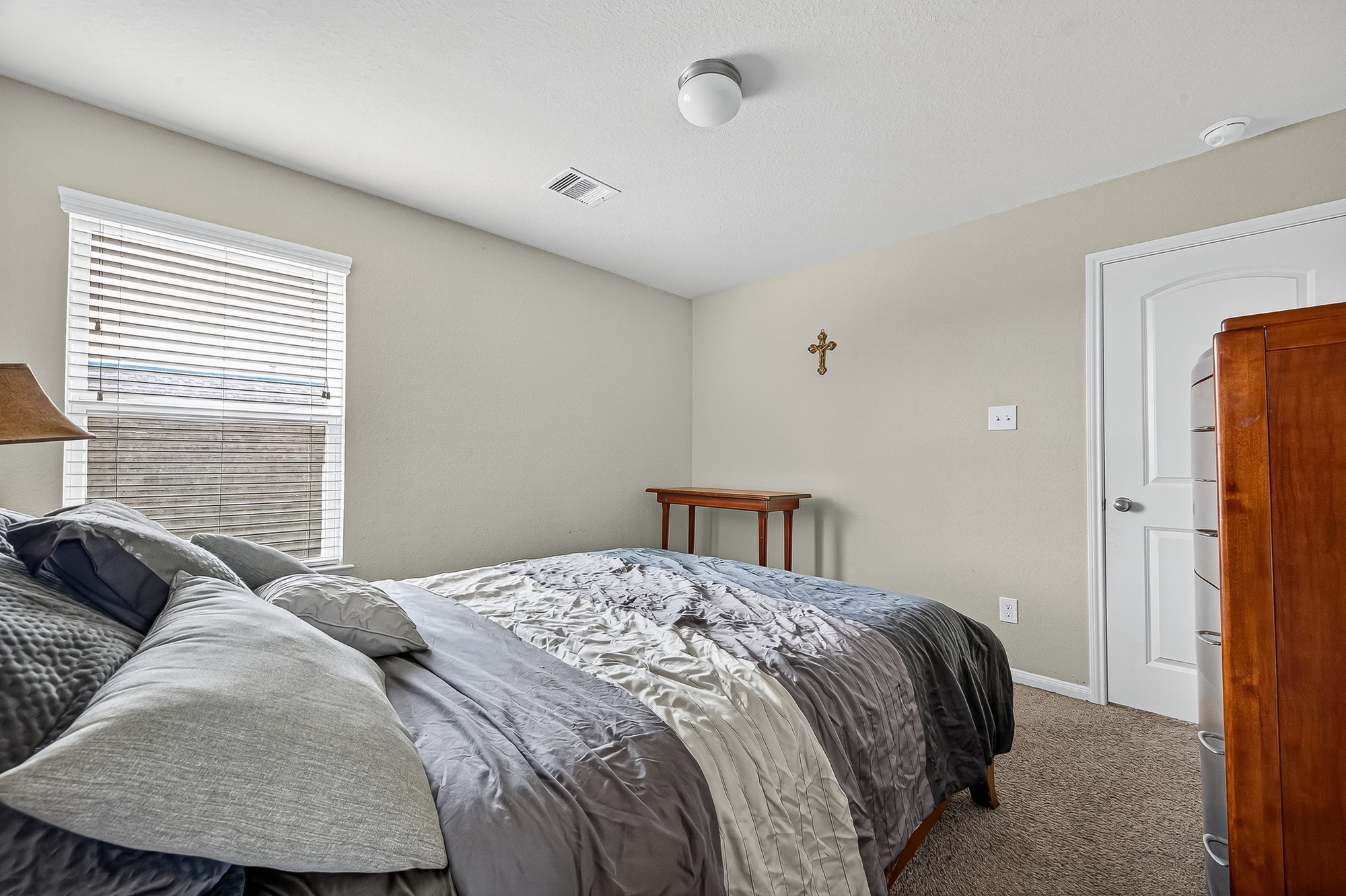 3035 Tandem Court Rosenberg, TX 77471 - Photo 26 of 28 a bedroom with a bed and wooden floor