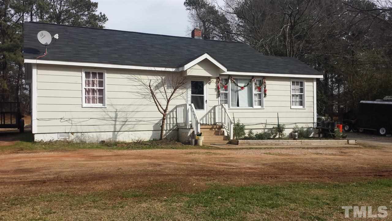 2909 Marion Road Raleigh, NC 27610 - Photo 1 of 10 a front view of a house with a yard