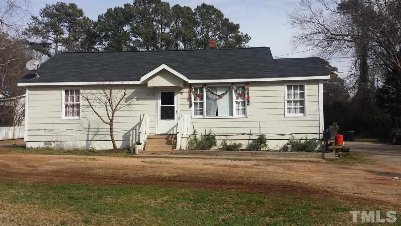 2909 Marion Road Raleigh, NC 27610 - Photo 2 of 10 a front view of a house with a yard