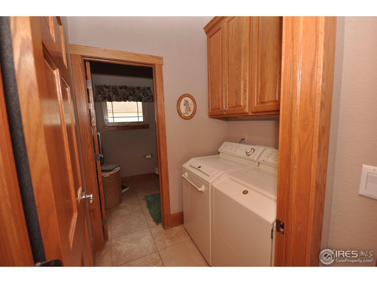 7717 Poudre River Road Greeley, CO 80634 - Photo 15 of 25 laundry on main