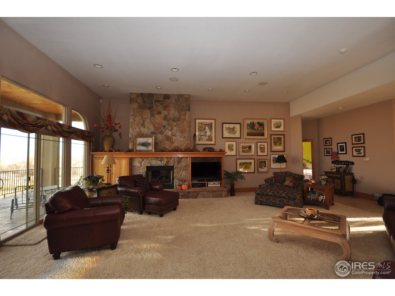 7717 Poudre River Road Greeley, CO 80634 - Photo 5 of 25 living room view from kitchen
