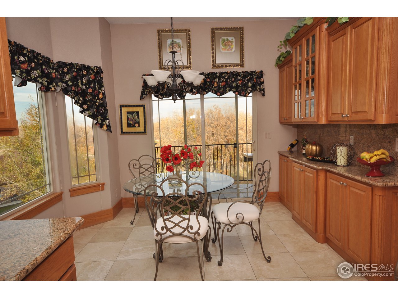 7717 Poudre River Road Greeley, CO 80634 - Photo 8 of 25 kitchen dinette with built in cabinets
