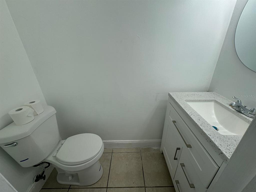 717 Southwest 75th Street, Unit 101 Gainesville, FL 32607 - Photo 6 of 19 a bathroom with a sink and a toilet