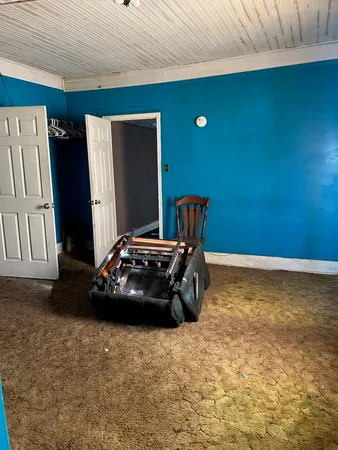 a room with furniture and window