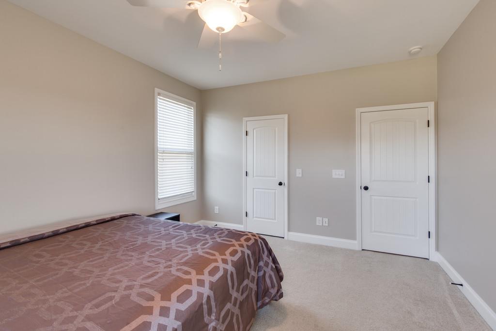 5482 Hickory Ridge Road Lebanon, TN 37090 - Photo 12 of 23 a bedroom with a bed and a window