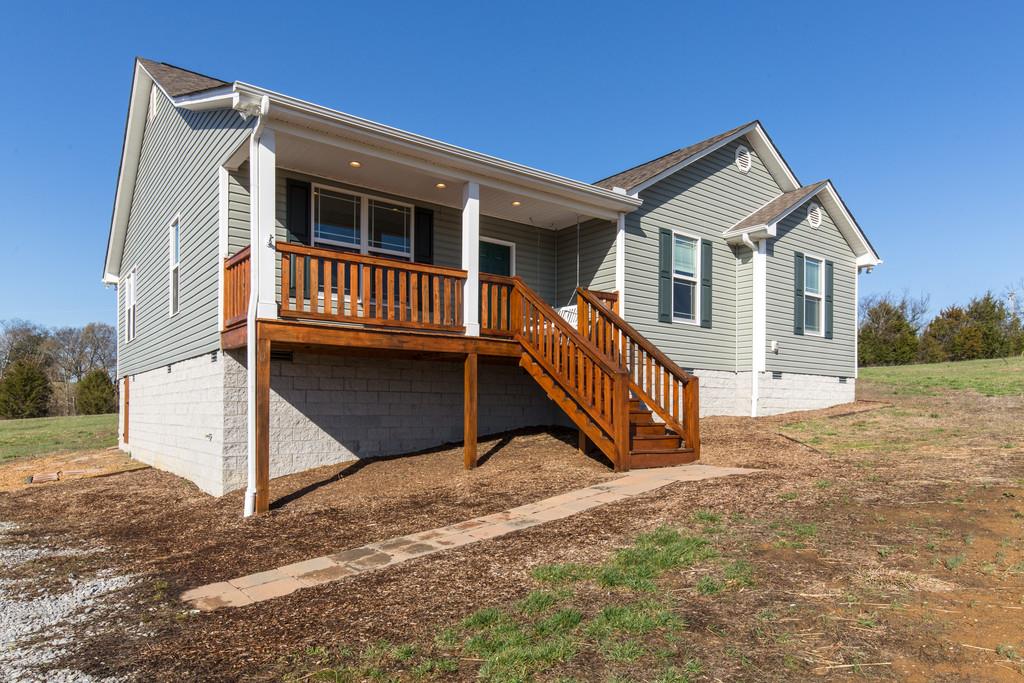 5482 Hickory Ridge Road Lebanon, TN 37090 - Photo 2 of 23 a view of a house with a yard