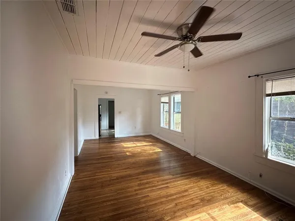 a view of an empty room and window