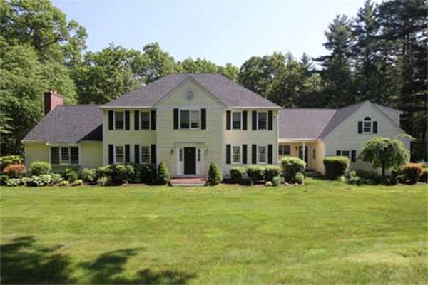 48 Newbridge Road Sudbury, MA 01776 - Photo 1 of 1 a front view of a house with a yard