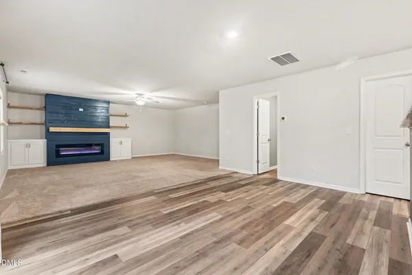 a big room with closet and a bathroom