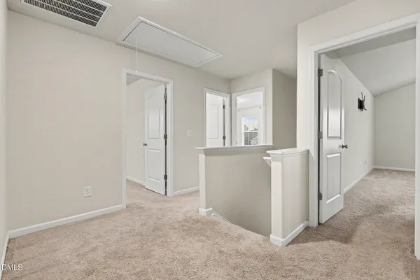 an empty room with a empty space and window