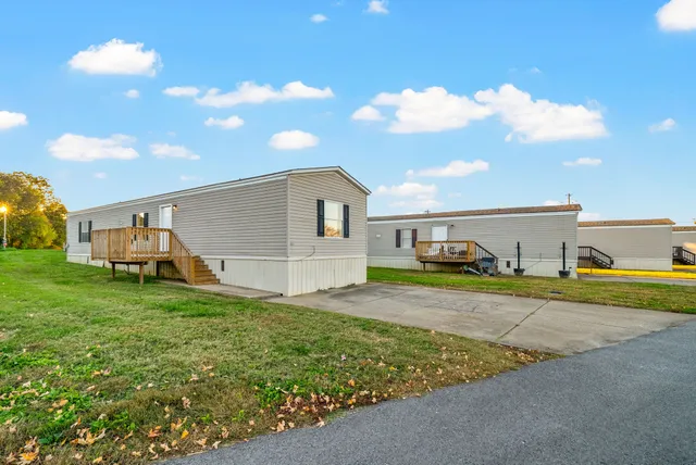 a view of a backyard of the house