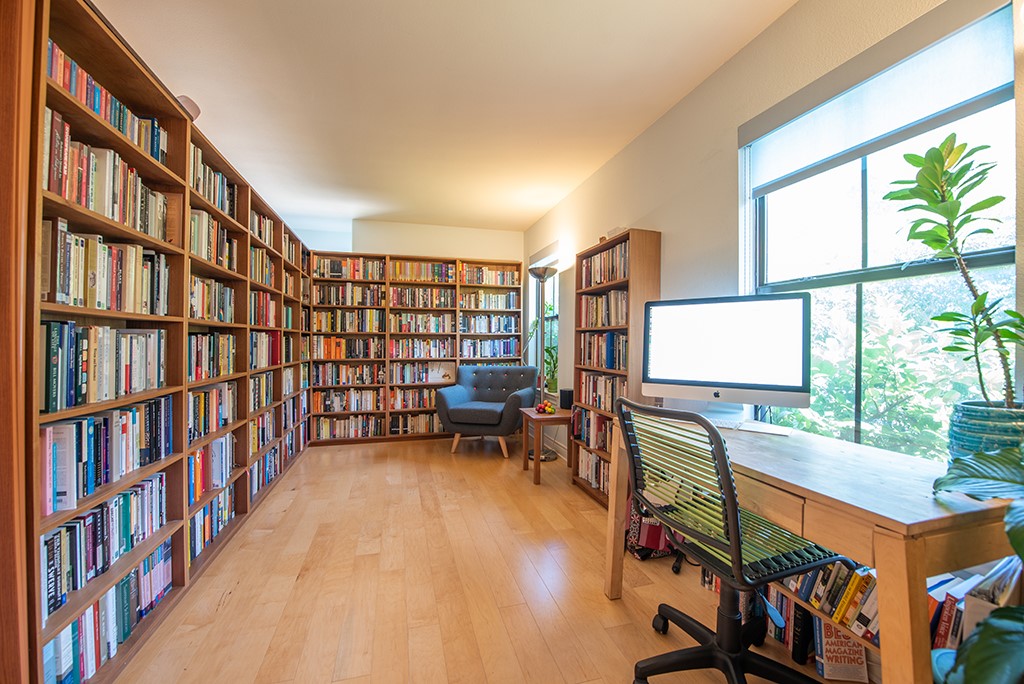 3609 Clawson Road, Unit A Austin, TX 78704 - Photo 7 of 17 A scholarly retreat, this well-lit study boasts extensive built-in bookcases and elegant hardwood flooring.