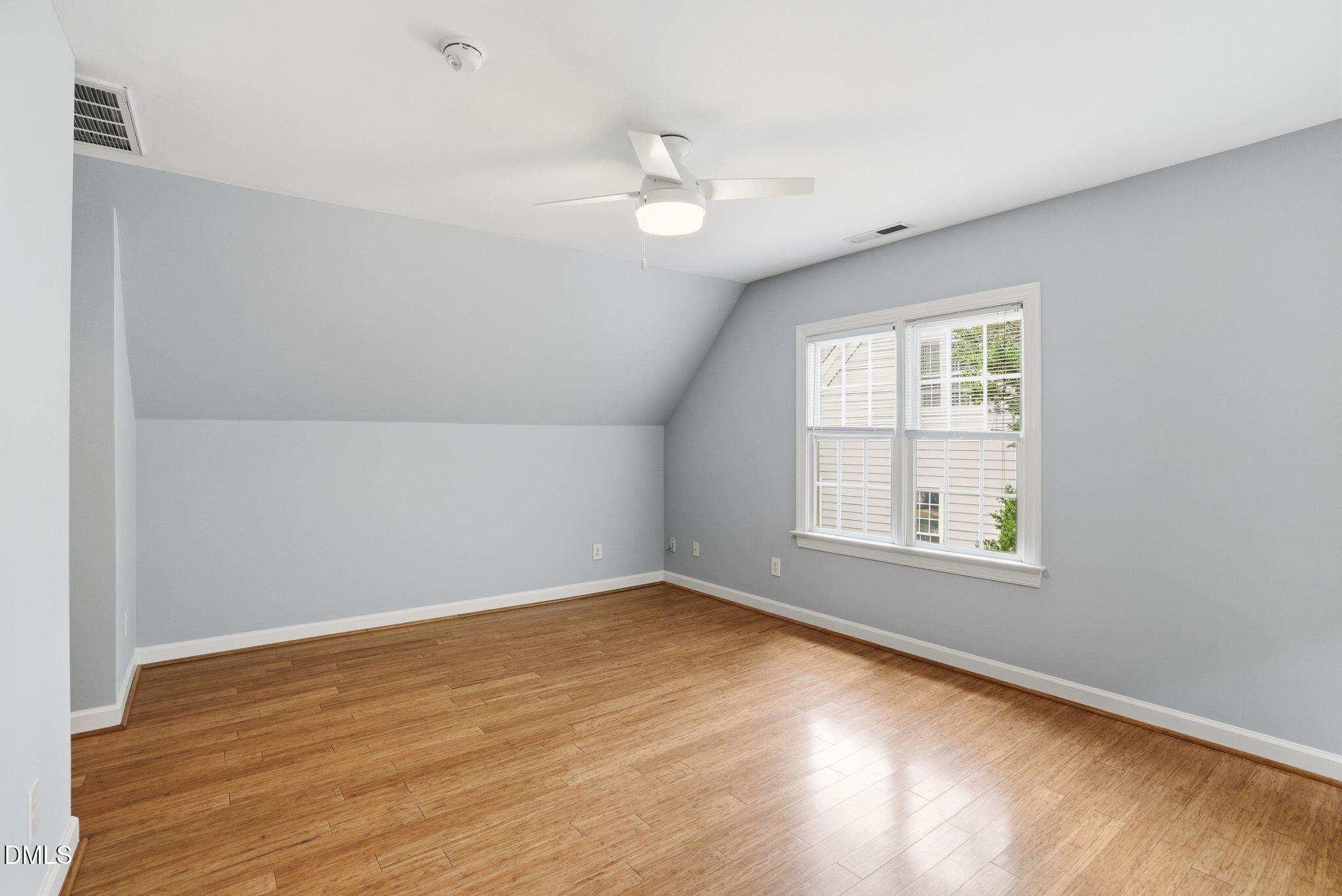 7 Morgans Ridge Lane Durham, NC 27707 - Photo 39 of 75 an empty room with wooden floor and windows