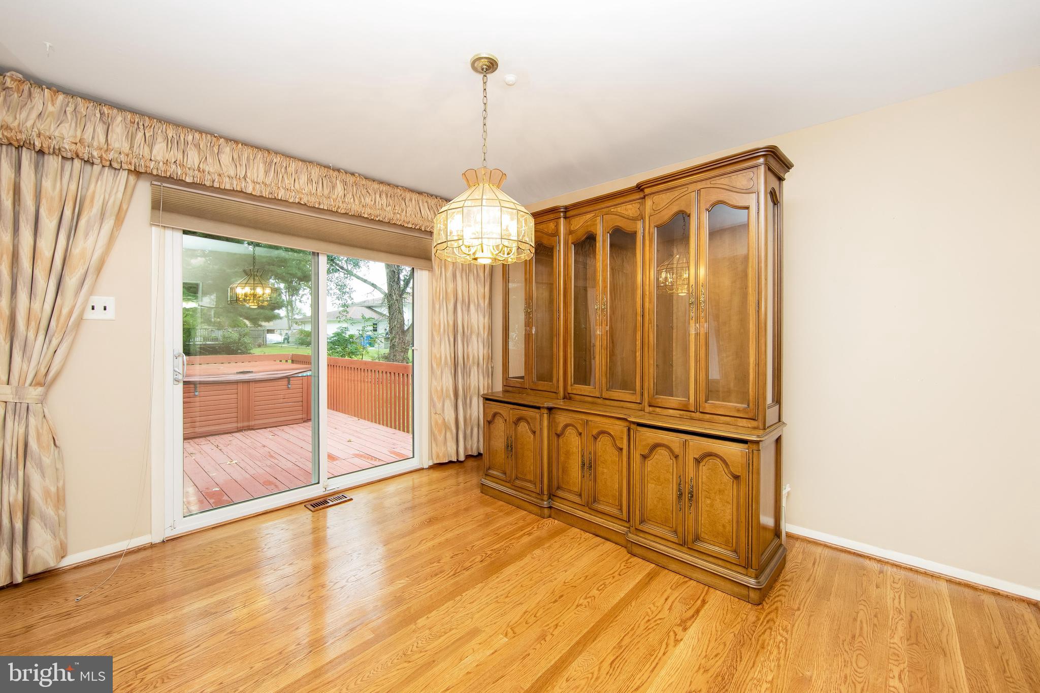 17 Strathmore Drive Cherry Hill, NJ 08003 - Photo 14 of 42 Formal Dining Room with Slider to Back Deck