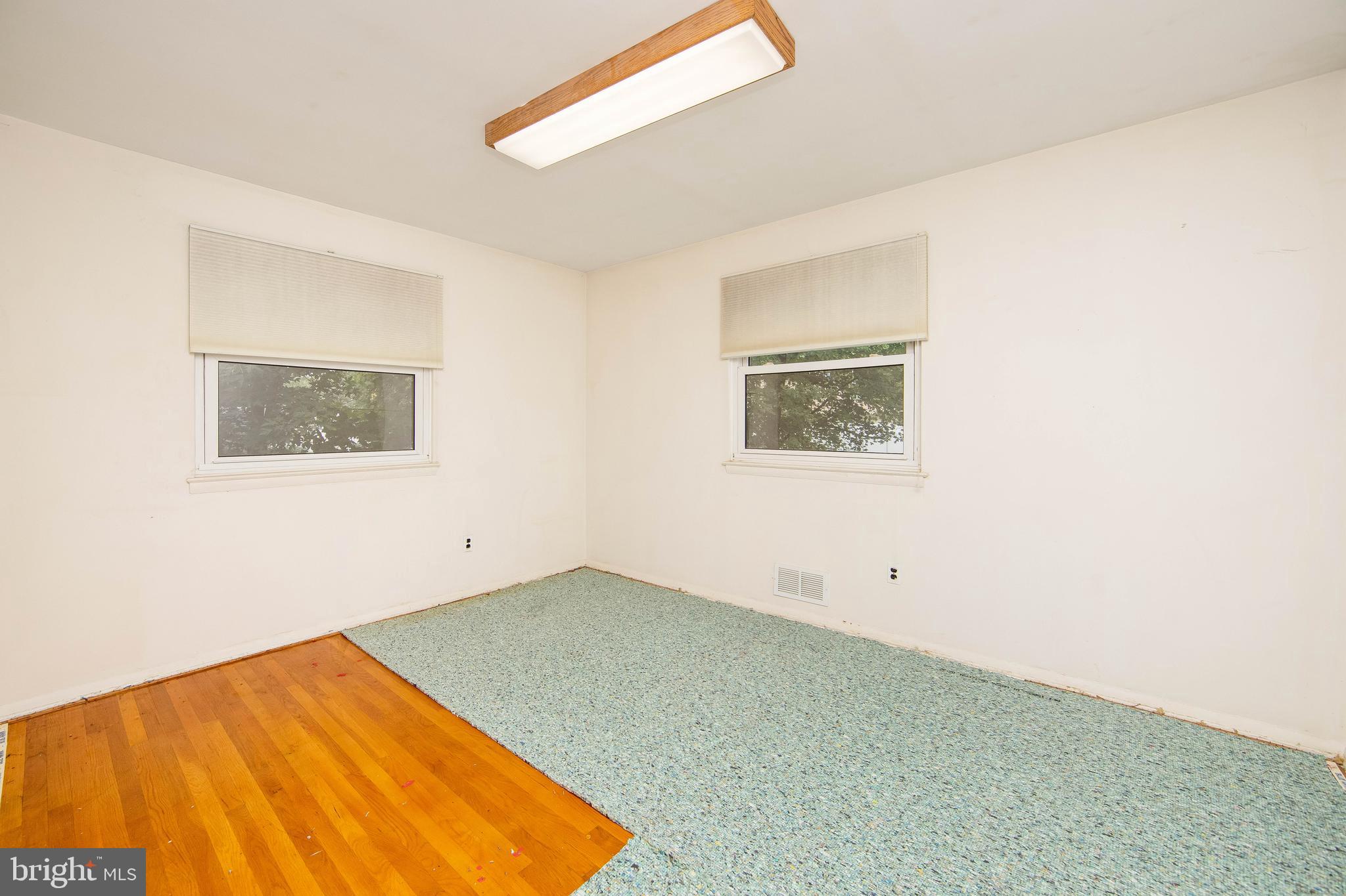 17 Strathmore Drive Cherry Hill, NJ 08003 - Photo 22 of 42 Bedroom 3 w/ Hardwood, NEW Carpet Being Installed