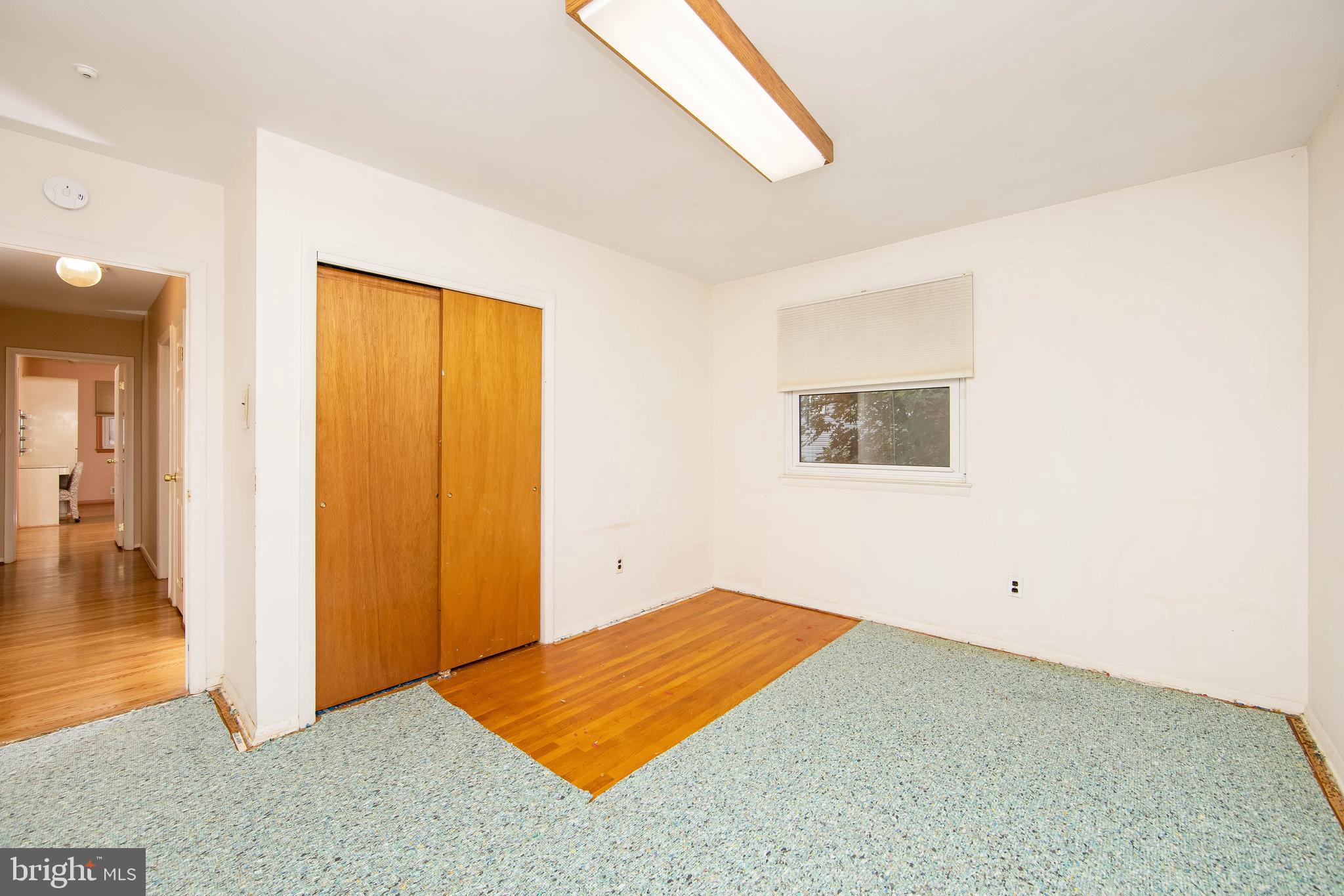 17 Strathmore Drive Cherry Hill, NJ 08003 - Photo 23 of 42 Bedroom 3 w/ Hardwood, NEW Carpet Being Installed