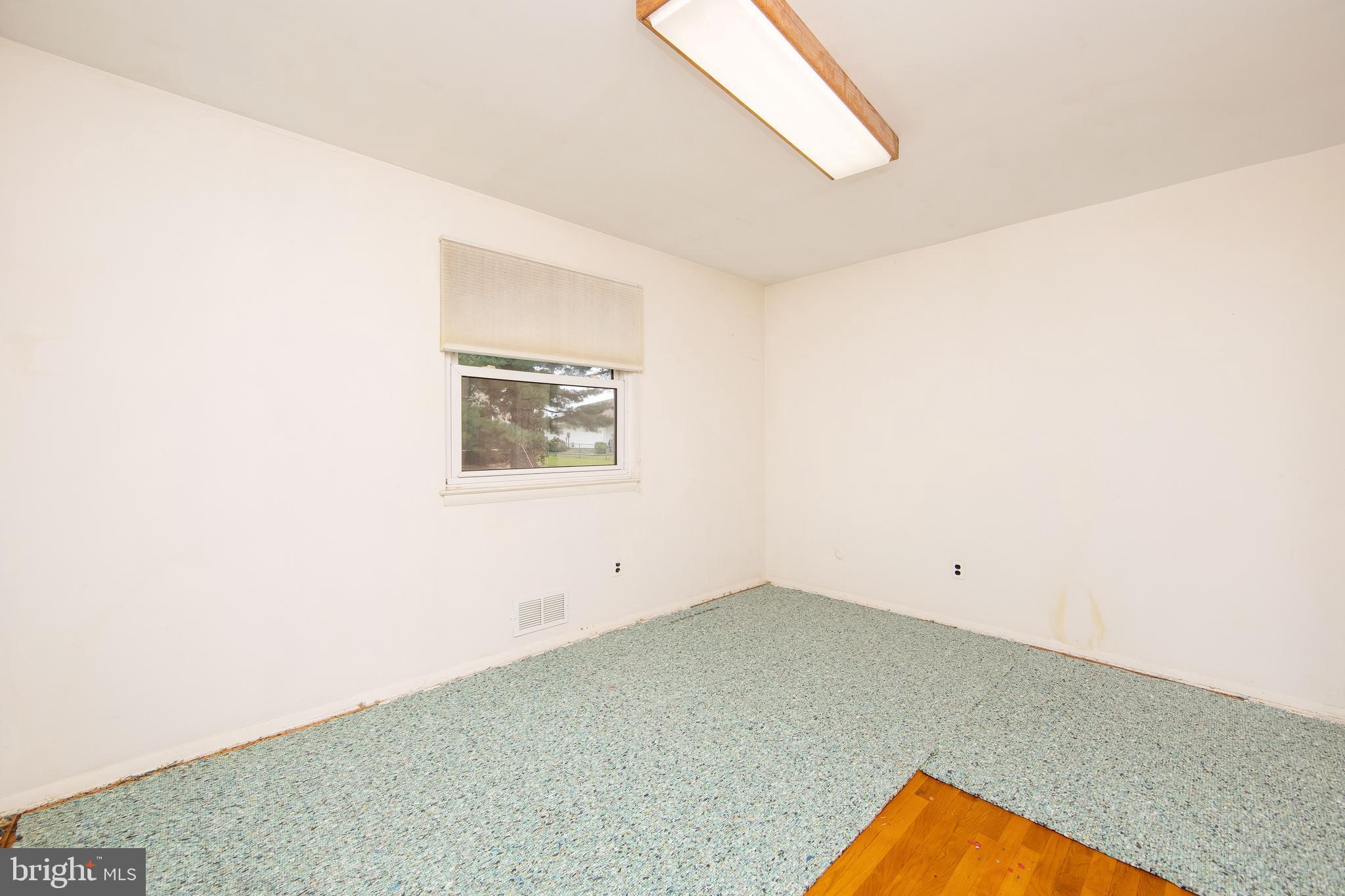 17 Strathmore Drive Cherry Hill, NJ 08003 - Photo 24 of 42 Bedroom 3 w/ Hardwood, NEW Carpet Being Installed