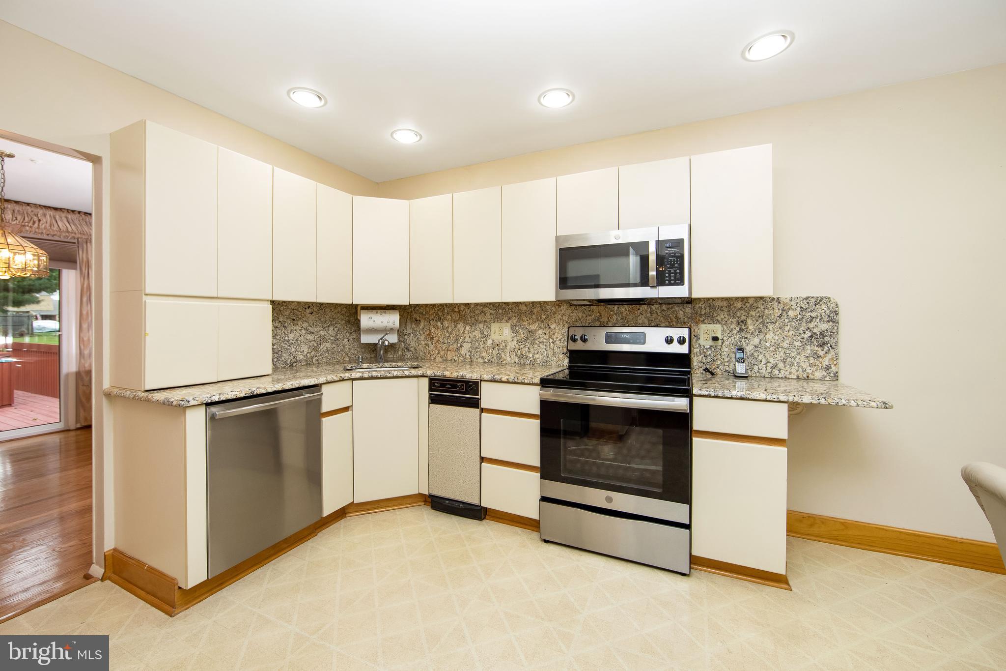 17 Strathmore Drive Cherry Hill, NJ 08003 - Photo 10 of 42 Kitchen with Granite Counters & Backsplash