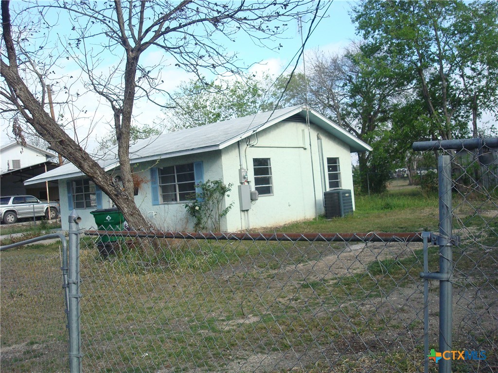 602 Silva Street Seguin, TX 78155 - Photo 2 of 3 a view of a house with a yard