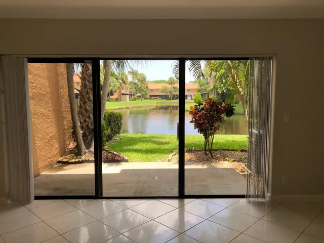 a view of swimming pool from a window