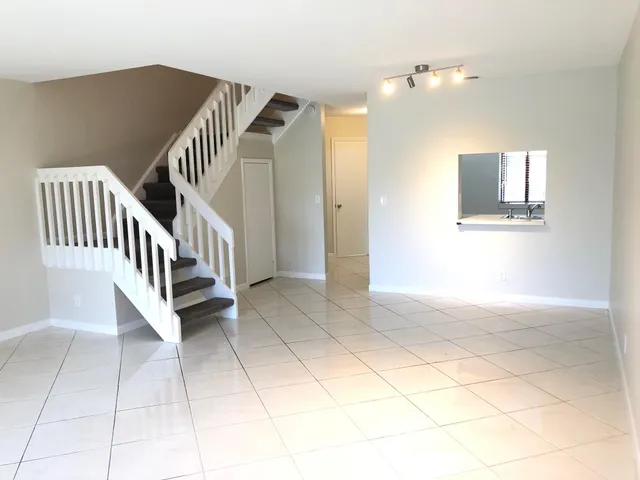a view of a livingroom with a lounge chair