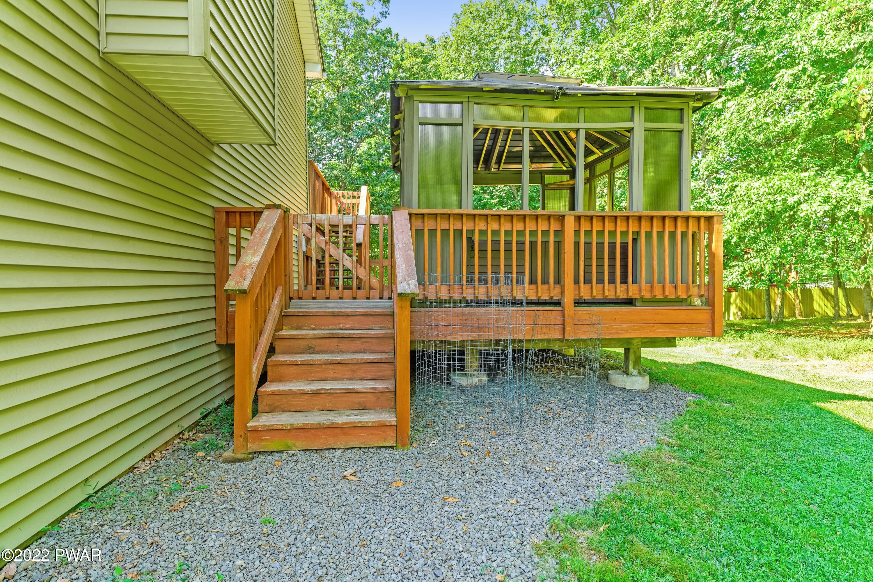 114 Lancaster Road Milford, PA 18337 - Photo 11 of 42 a view of a deck with a small yard