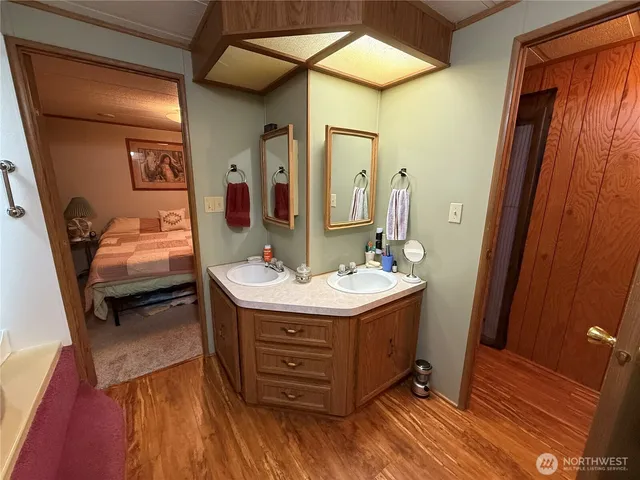 a bathroom with a sink and a mirror