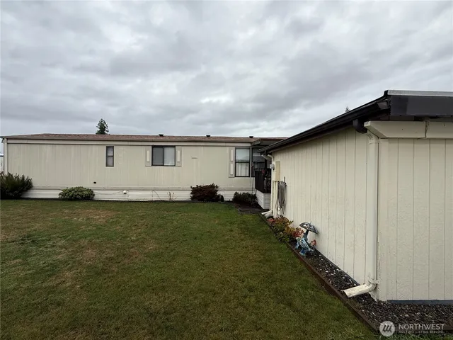 a house view with a garden space