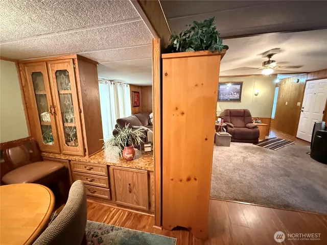 a view of living room filled with furniture