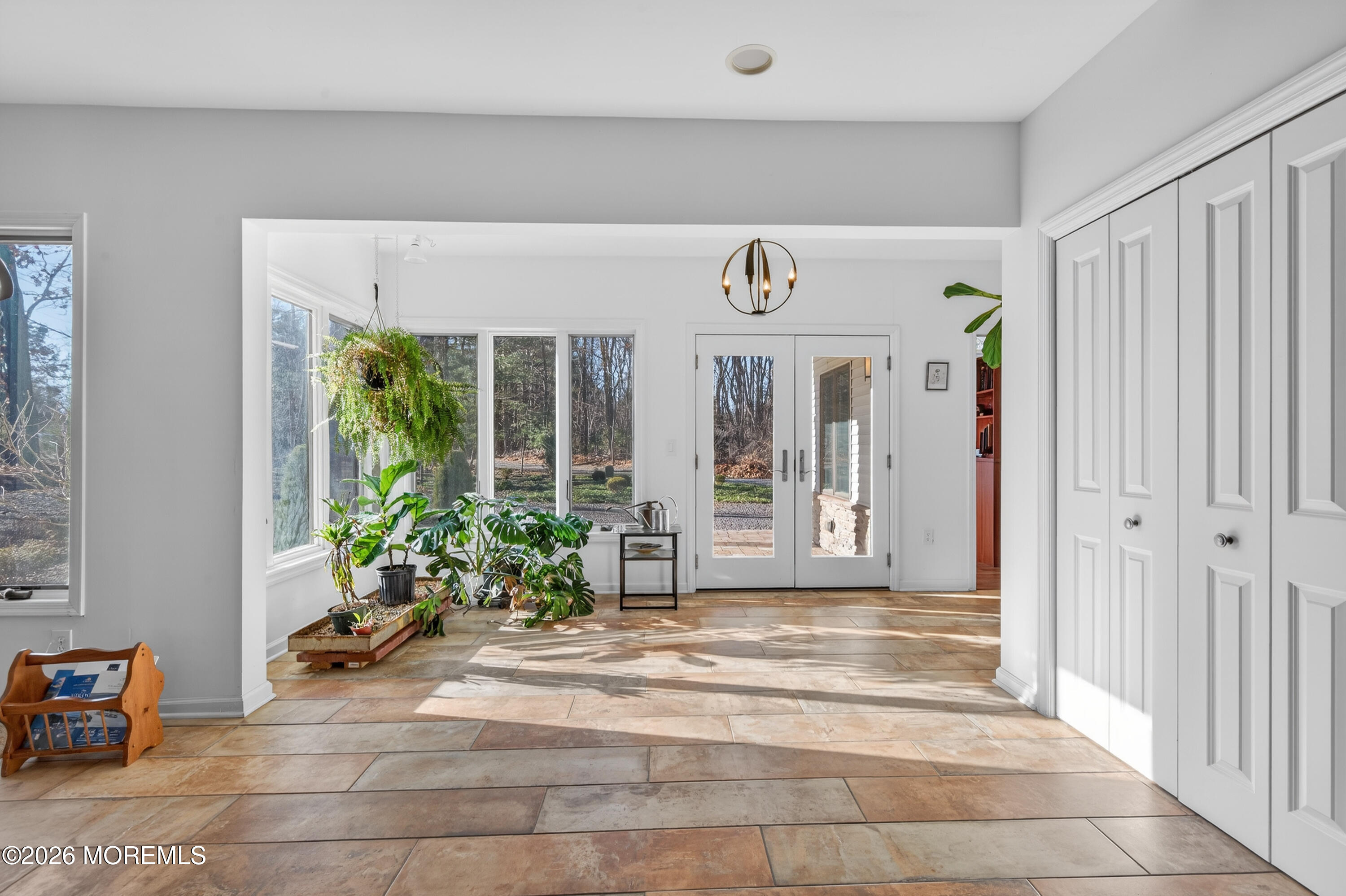 184 Smithburg Road Manalapan, NJ 07726 - Photo 24 of 45 a living room with furniture and a potted plant