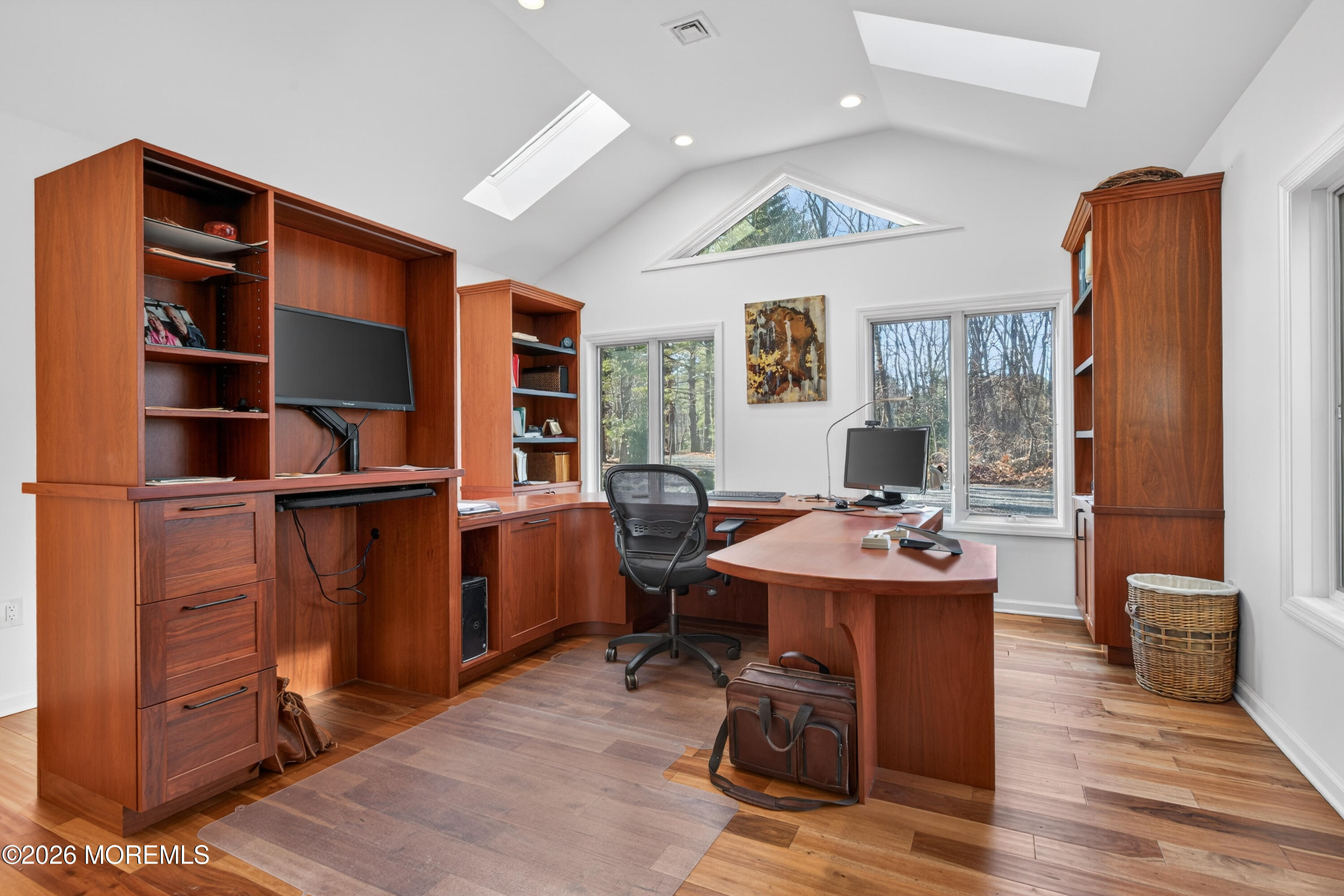 184 Smithburg Road Manalapan, NJ 07726 - Photo 29 of 45 a workspace with furniture a window and wooden floor