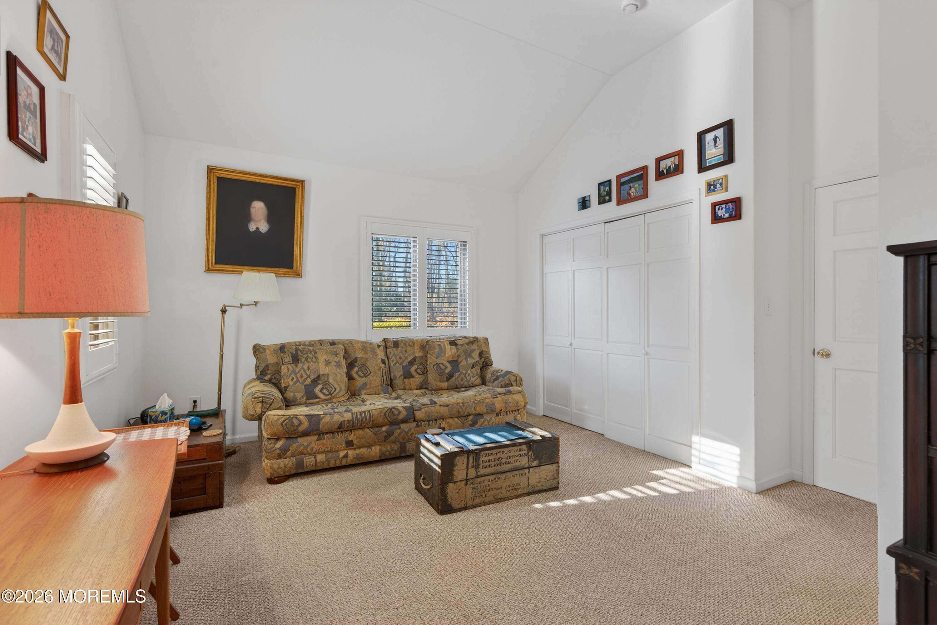 184 Smithburg Road Manalapan, NJ 07726 - Photo 30 of 45 a living room with furniture and a lamp