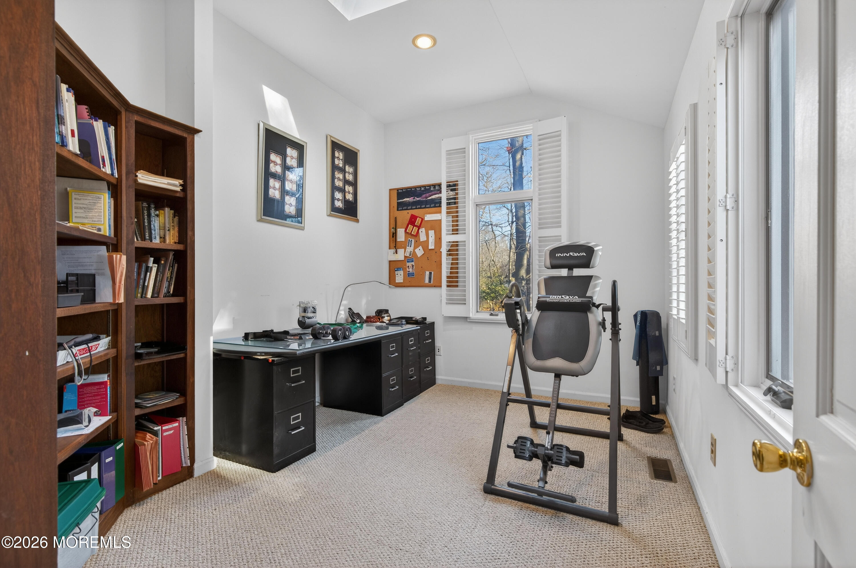184 Smithburg Road Manalapan, NJ 07726 - Photo 33 of 45 a view of a workspace with furniture and a window
