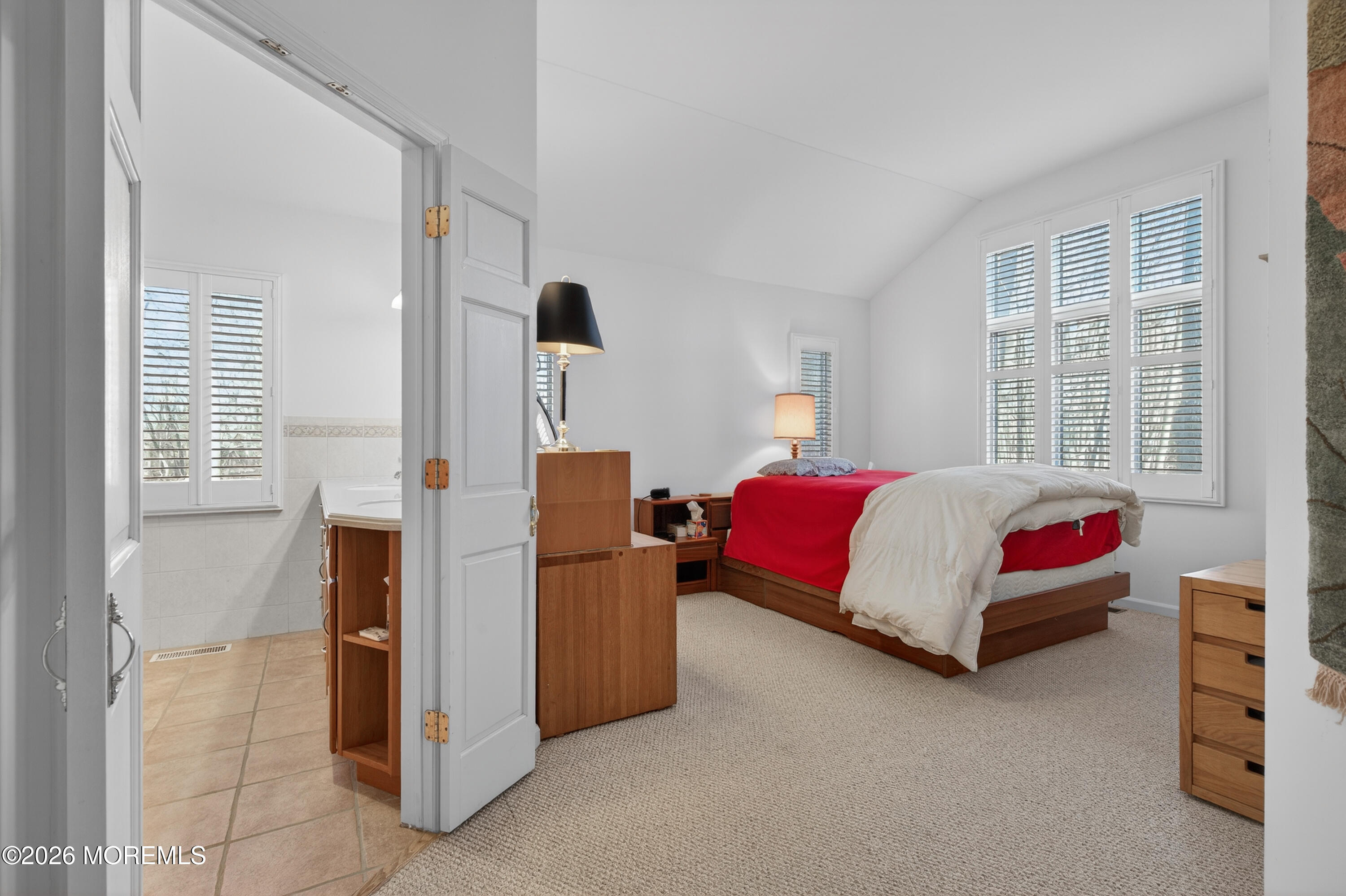 184 Smithburg Road Manalapan, NJ 07726 - Photo 34 of 45 a bedroom with a bed and a cabinets