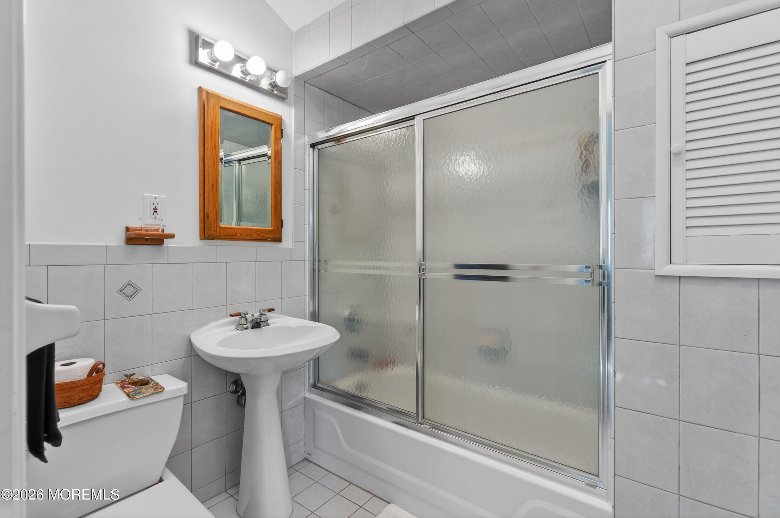 184 Smithburg Road Manalapan, NJ 07726 - Photo 36 of 45 a bathroom with a sink toilet and shower