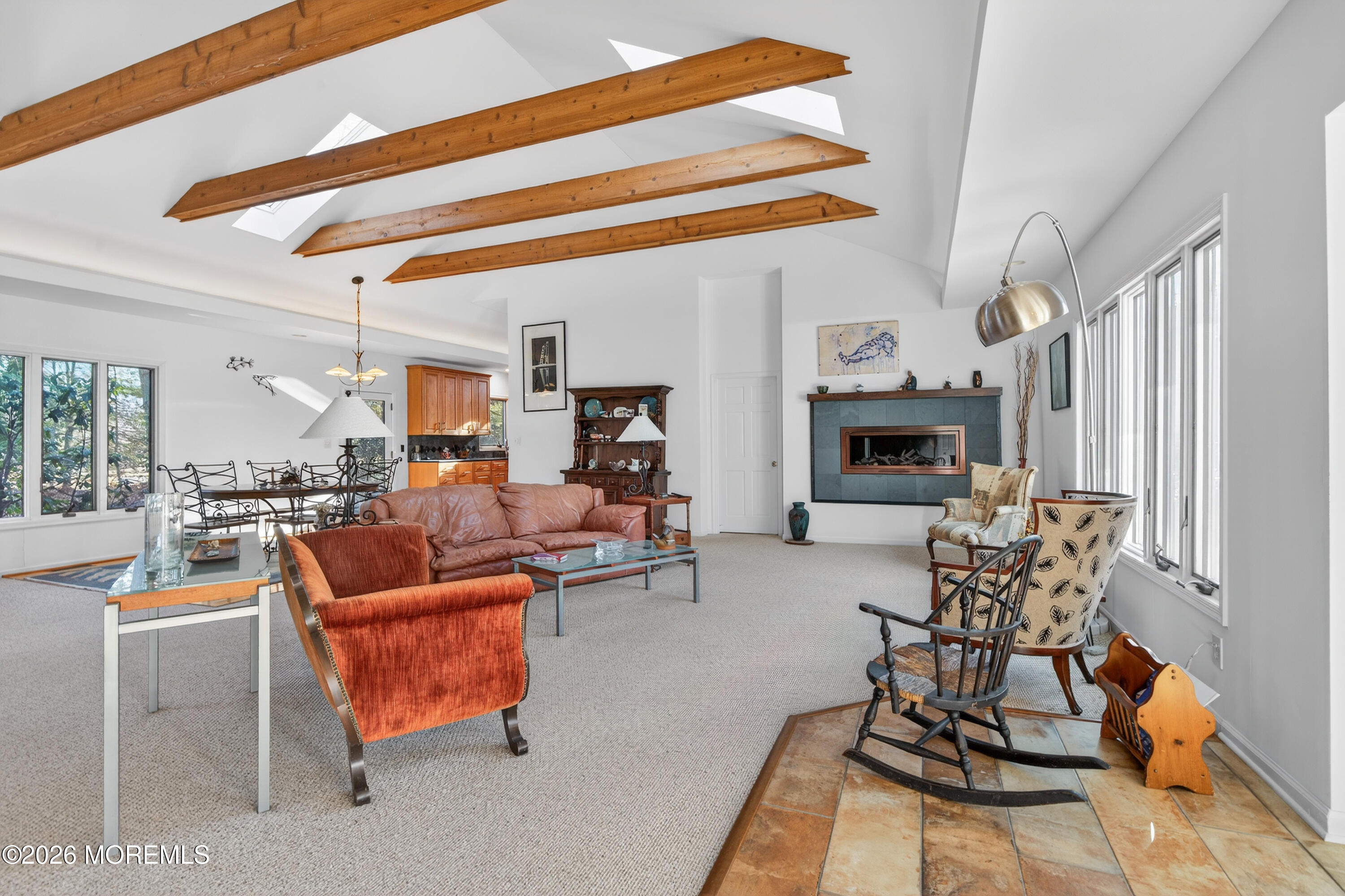184 Smithburg Road Manalapan, NJ 07726 - Photo 4 of 45 a living room with furniture and a fireplace