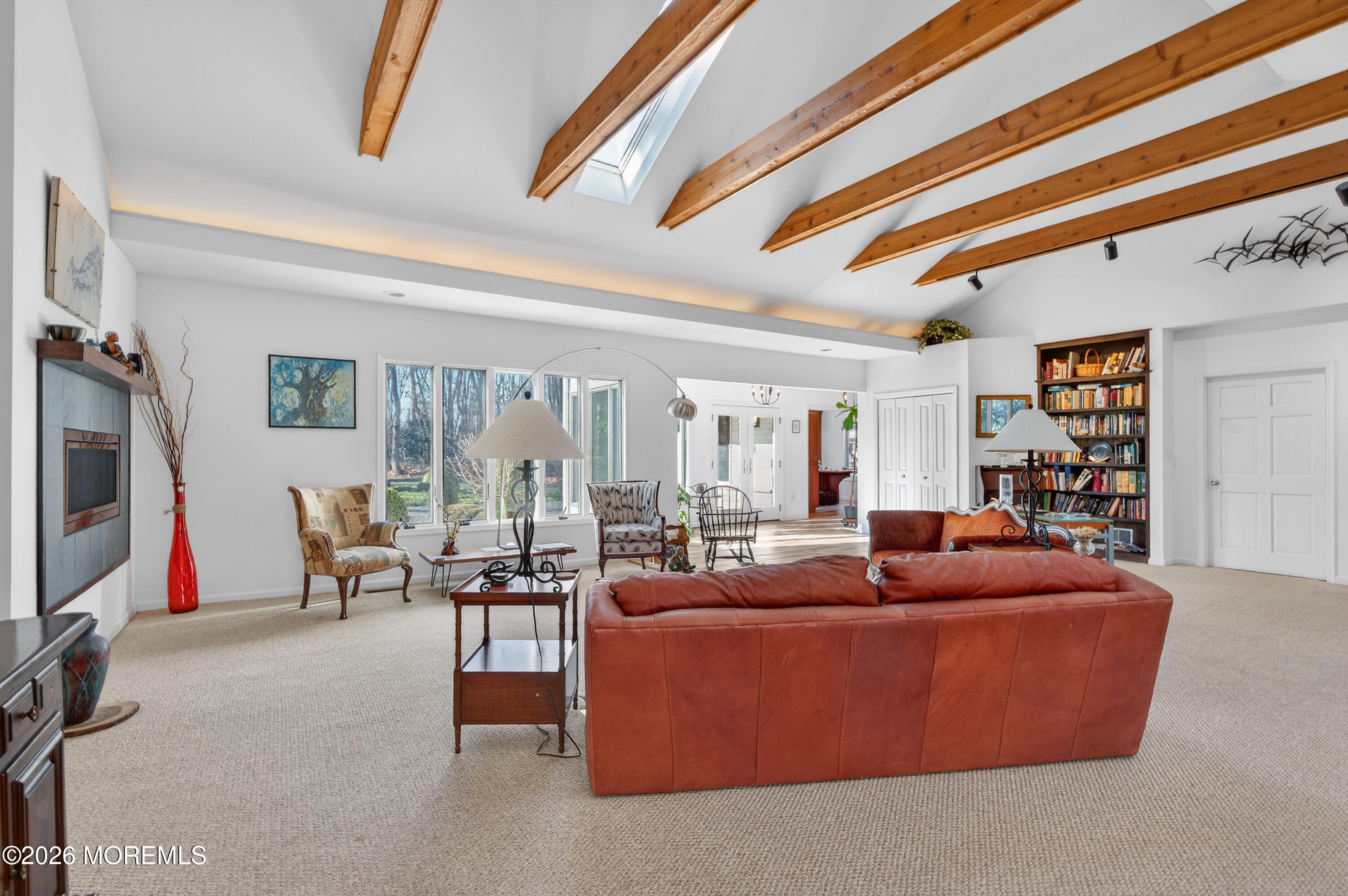 184 Smithburg Road Manalapan, NJ 07726 - Photo 5 of 45 a living room with furniture and a flat screen tv