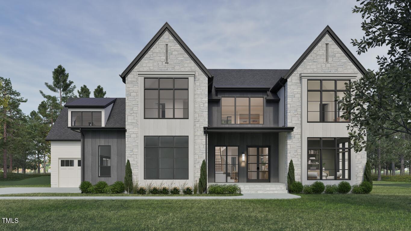 front view of a house with a yard