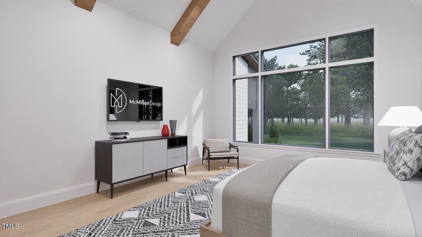 962 Shelley Road Raleigh, NC 27609 - Photo 14 of 34 a room with a bed and a window