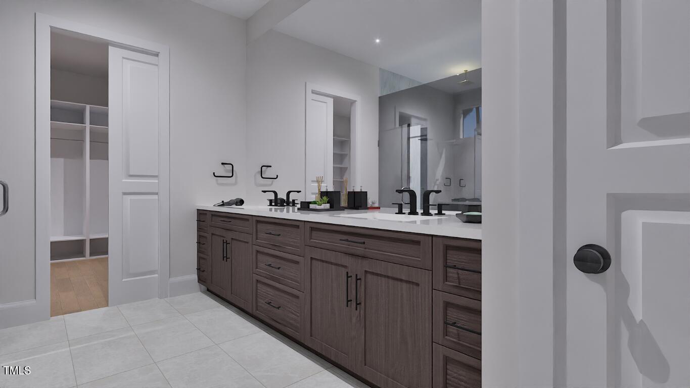 962 Shelley Road Raleigh, NC 27609 - Photo 15 of 34 a bathroom with a double vanity sink a and mirror