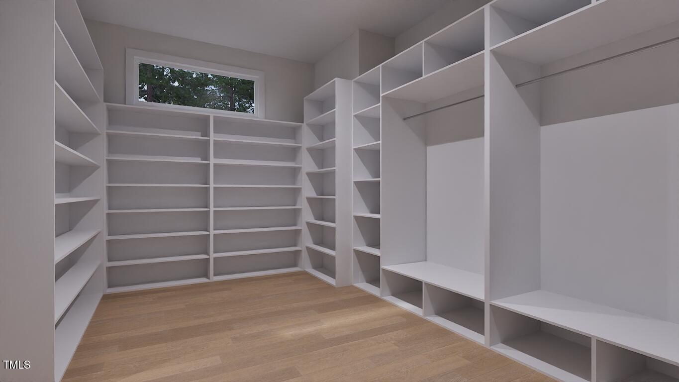 962 Shelley Road Raleigh, NC 27609 - Photo 17 of 34 a view of an empty walk in closet
